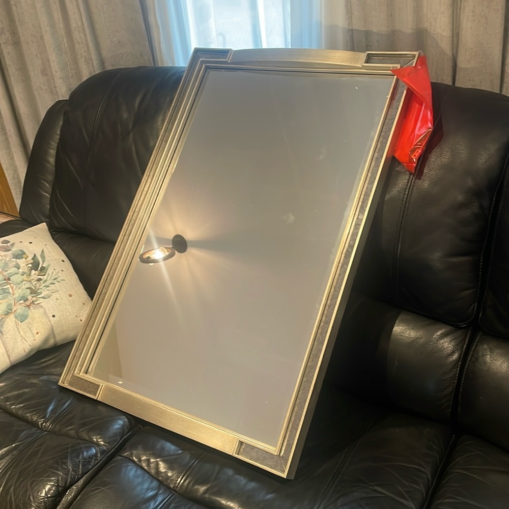 Capital lighting mirror
